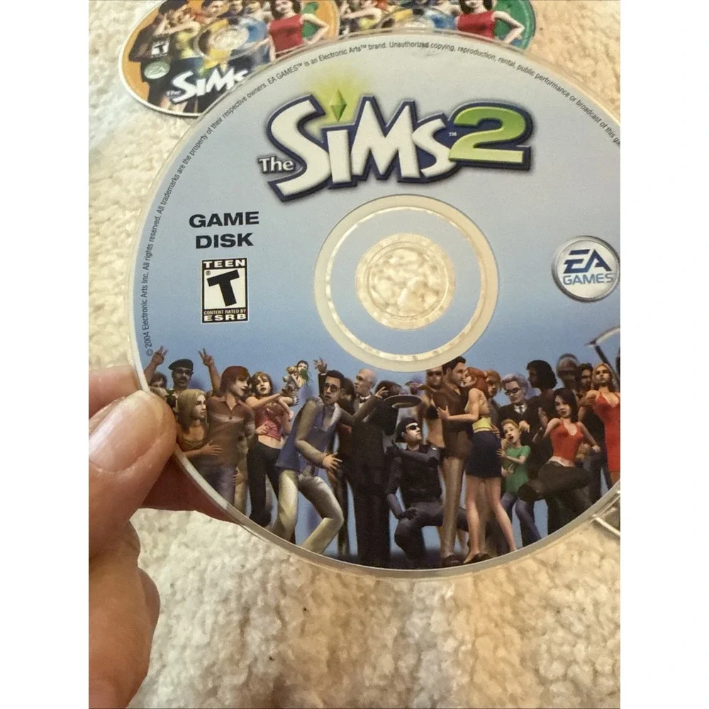 The Sims 2 (PC, 2004 - 5 Discs) Complete No Manual Pre Owned Case Needs Work